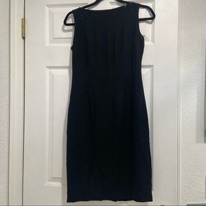 Beaded black dress. Simple and modest chest size 4